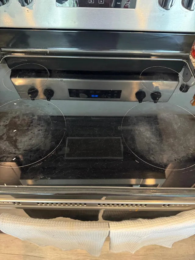 Before: Glass stovetop — deep cleaning