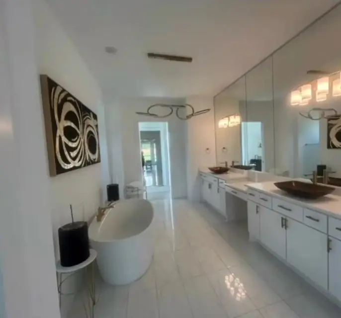 Master bathroom with freestanding tub, spotless